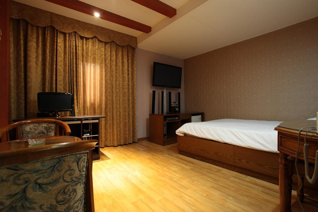 Monaco Hotel Jeju Quarto foto