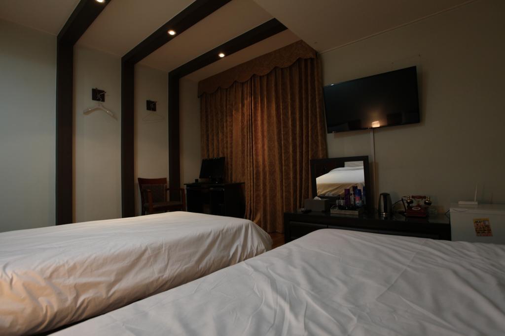 Monaco Hotel Jeju Quarto foto